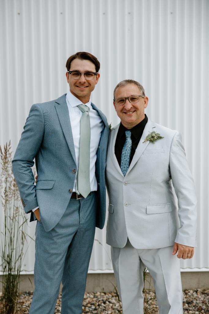 Scott and Cade Kontny standing together